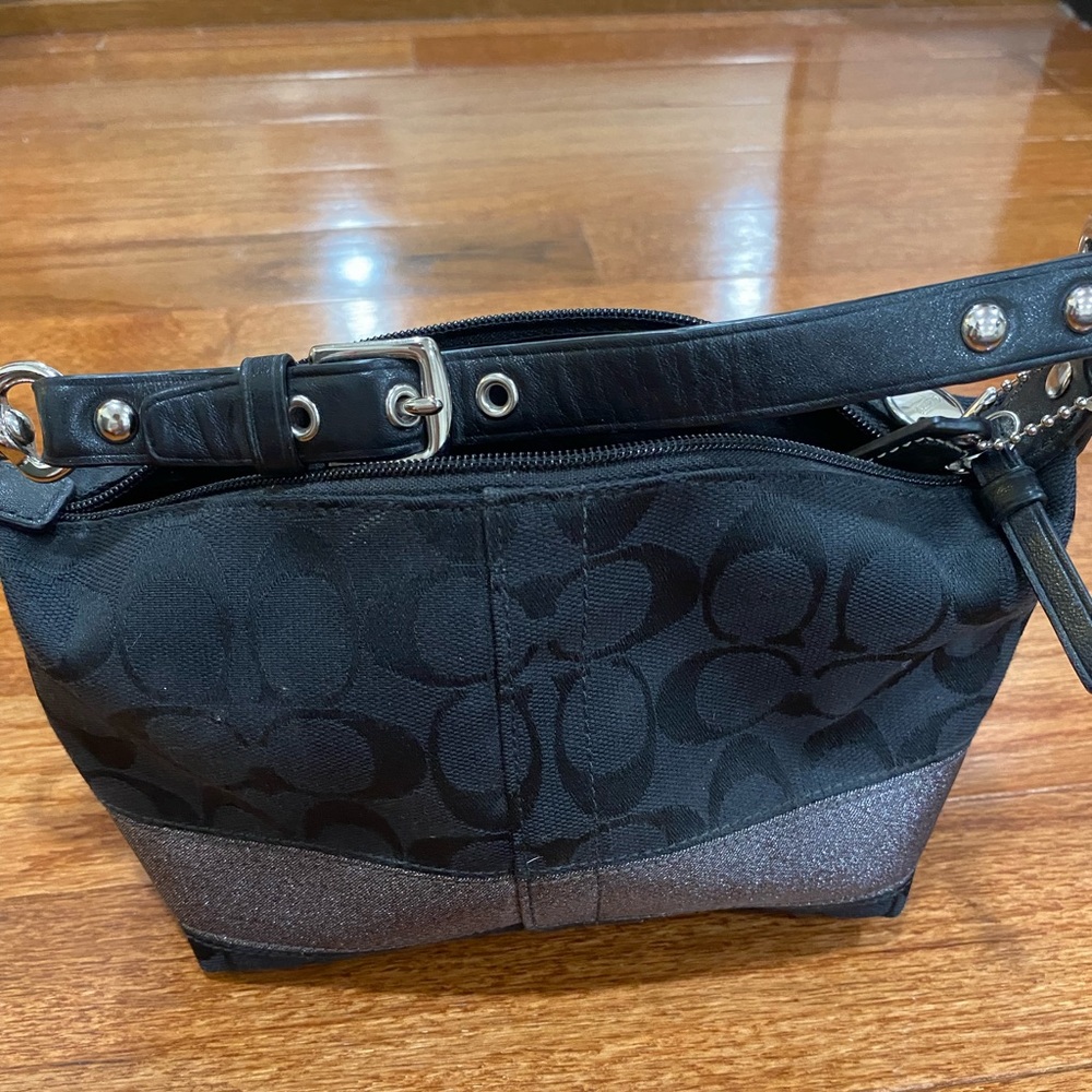 A black small coach bag